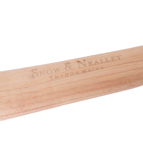 Close-up of smooth hickory handle with the embossed Snow & Nealley brand name, showcasing handcrafted Amish-made quality in woodcutting and camping tools.