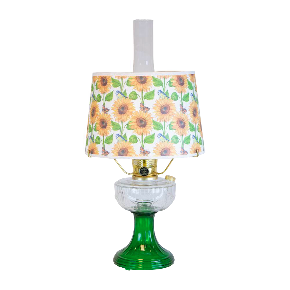Handcrafted oil lamp with a clear chimney, featuring an Ohio-made emerald glass base and a bright sunflower-patterned shatterproof parchment shade, perfect for Farm, Garden & Tool, Lamps & Lighting, and Emergency Supplies collections.