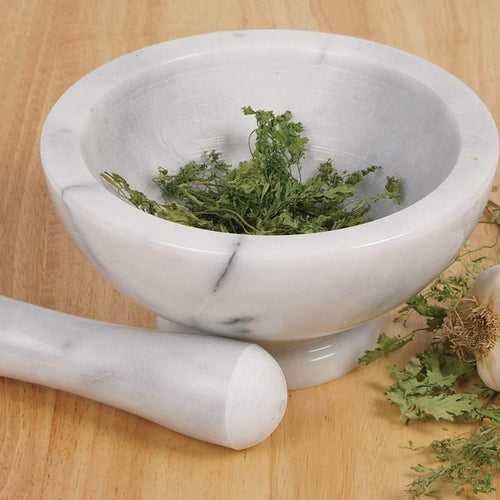 Handcrafted solid marble mortar and pestle with natural veining, durable and flavor-neutral for grinding herbs and spices, featured in Kitchen & Food, Food Prep, Choppers and Cutters, Best Sellers, and Promo Eligible collections.