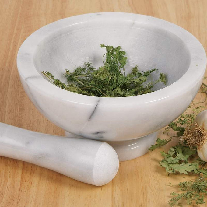 Handcrafted solid marble mortar and pestle with natural veining, durable and flavor-neutral for grinding herbs and spices, featured in Kitchen & Food, Food Prep, Choppers and Cutters, Best Sellers, and Promo Eligible collections.