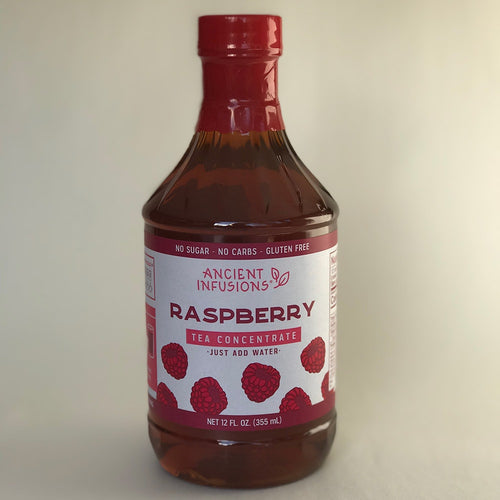 Bottle of handcrafted raspberry-flavored tea concentrate made in USA, gluten-free and sugar-free, part of Kitchen & Food, Beverages, and Best Sellers collections.