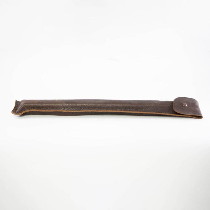 Handcrafted dark brown leather sheath with stitched edges and button closure, designed to protect and carry wood cutting tools in Farm, Garden & Tool and Wood Cutting and Hauling collections.