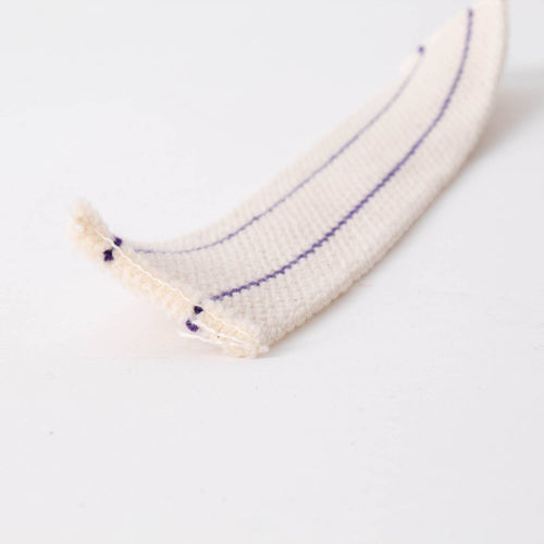 Close-up of a durable cotton lamp wick with two parallel purple stitching lines, designed for French oil lamps, featured in Lamps & Lighting, Parts and Accessories, Wicks and Mantles, Best Sellers, and Promo Eligible collections.