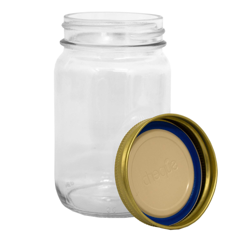 Clear regular-mouth glass canning jar alongside a durable metal lid with blue sealing ring, designed for food preservation in Kitchen & Food, Canning, and USA Made collections.