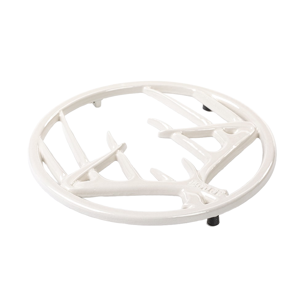 Round enamel trivet with antler-inspired design in off-white, featuring a chip-resistant finish, rubber feet for stability, and built-in hanger, ideal for Kitchen & Food, Dinnerware, Storage and Serving, Best Sellers, and Promo Eligible collections.