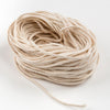 Coiled natural flat-braid wick with 30 plies, suited for crafting pillar or taper candles, featured in Lamps & Lighting, Candles and Candlemaking, and Candlemaking Supplies collections.