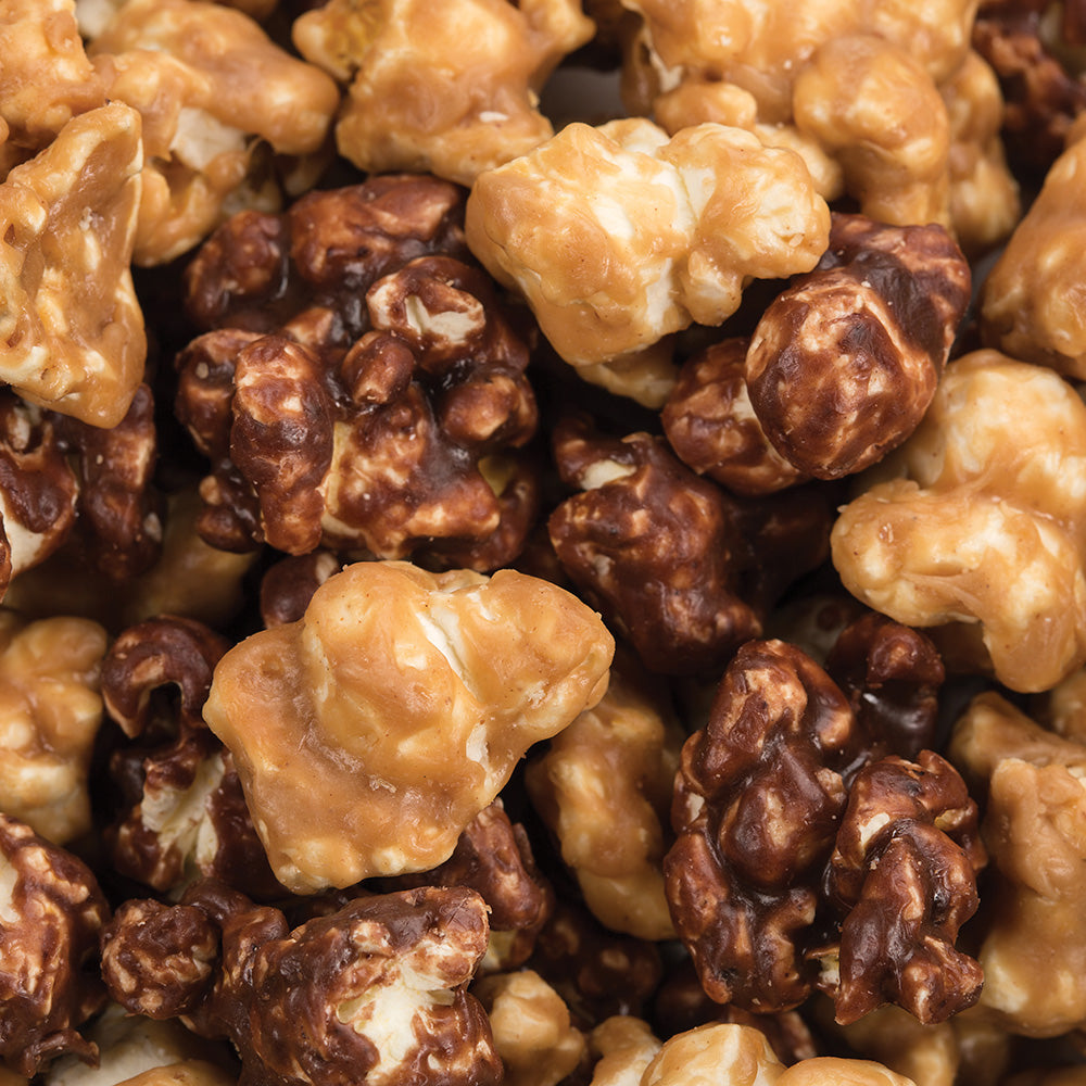 Close-up of handcrafted popcorn in rich chocolate and caramel coatings, showcasing fresh, locally made snack from Amish Country, featured in Kitchen & Food, Snacks and Sweets, Popcorn, USA Made, and Best Sellers collections.