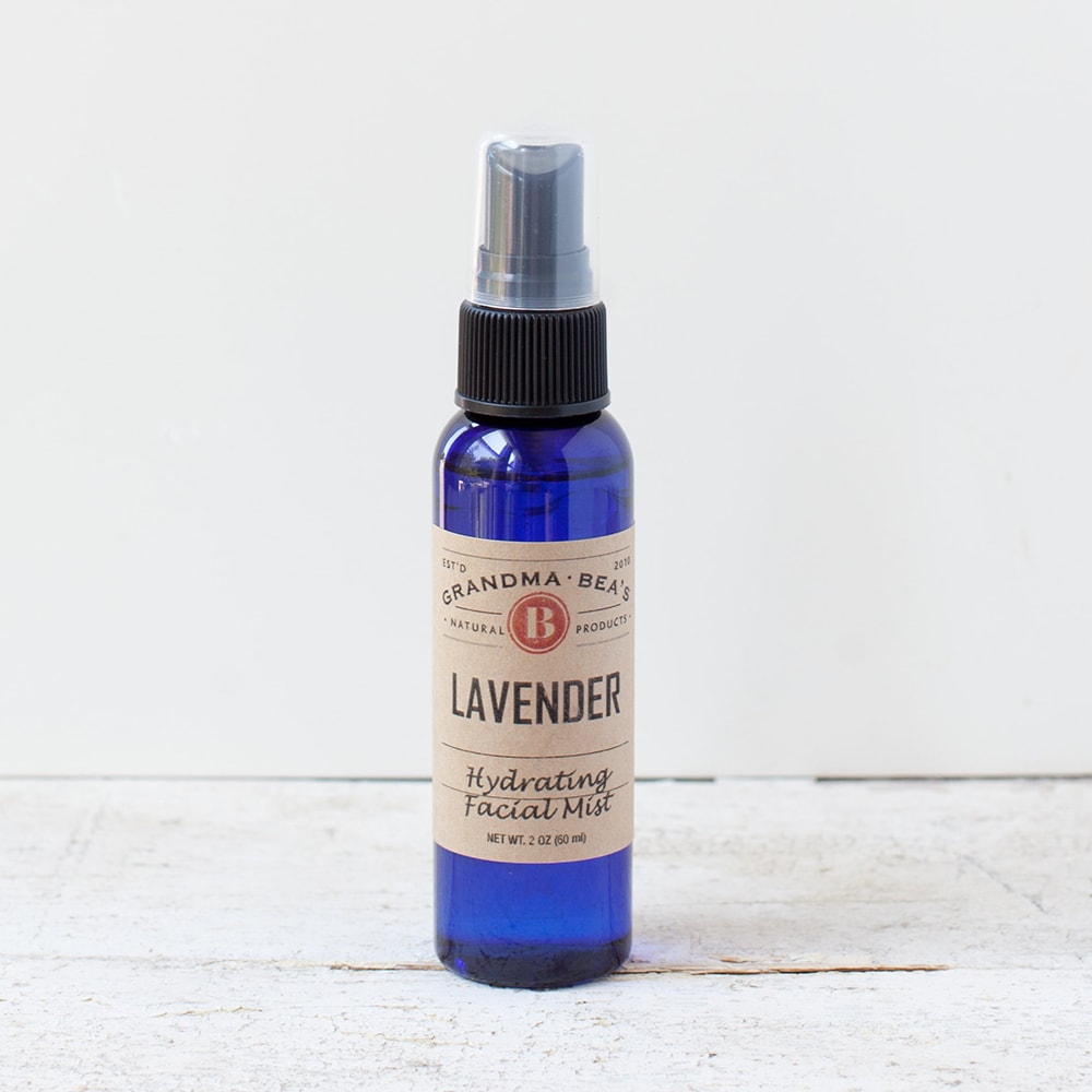 Handcrafted blue glass spray bottle of lavender hydrating facial mist made in USA, featured in Health & Wellness, Grooming and Personal Hygiene, Best Sellers, and Promo Eligible collections.