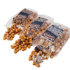Three clear bags of Lehman's caramel popcorn varieties spilling out savory and sweet mixes featuring chocolate cookies, peanut butter bites, and s'mores crunch, part of Kitchen & Food, Snacks and Sweets, Popcorn, USA Made, and Best Sellers collections.