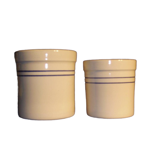 Handcrafted stoneware crocks in natural clay with heritage blue stripes, perfect for food preservation, kitchen decor, and fermenting, made in the USA for home use.