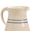 Handcrafted natural stoneware pitcher with two blue stripes, made in the USA, perfect for serving or decor, featured in Kitchen & Food, Dinnerware, and Storage collections.