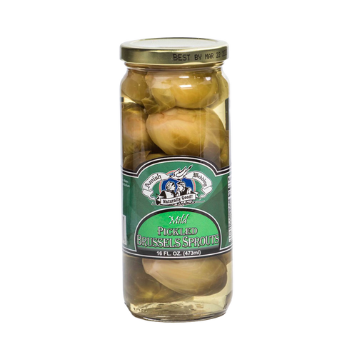 Clear glass jar of handcrafted mild pickled Brussels sprouts in light brine with a green label and gold lid, made in USA, featured in Kitchen & Food, Pantry, Best Sellers, and Promo Eligible collections.