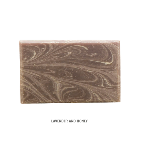 Handcrafted rectangular soap bar with swirling lavender and honey tones, naturally made in the USA, featured in Health & Wellness, Grooming and Personal Hygiene, Soaps collections.