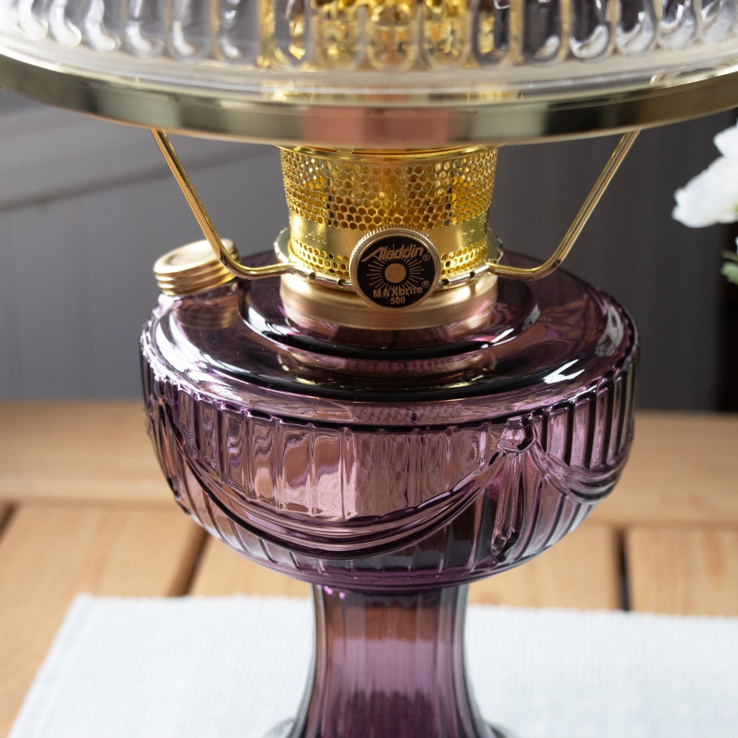 Handcrafted amethyst glass base oil lamp with polished brass burner and clear ribbed chimney, designed for Farm, Garden & Tool, Lamps & Lighting, Emergency Supplies, Oil Lamps, Table Lamps, Best Sellers, and Promo Eligible collections.