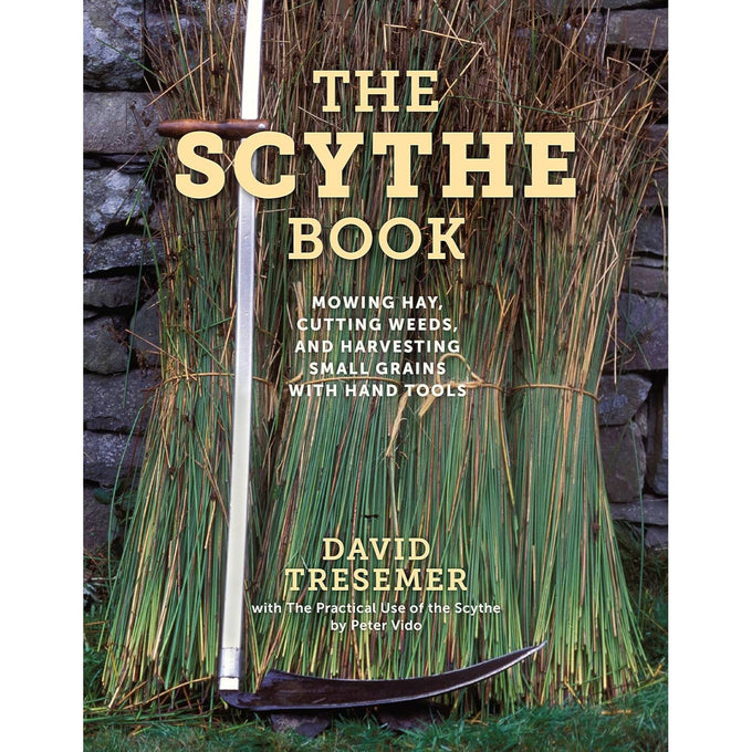 Cover of a guidebook titled "The Scythe Book" featuring a detailed image of a traditional scythe resting against bundled hay stalks, ideal for Farm, Garden & Tool, Lawncare, Best Sellers, Promo Eligible collections.