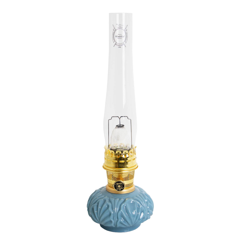 Handcrafted limited edition oil lamp with distinctive blue glass base, brass burner, and tall clear chimney, featured in Lamps & Lighting, Oil Lamps, Table Lamps, Best Sellers, and Promo Eligible collections.