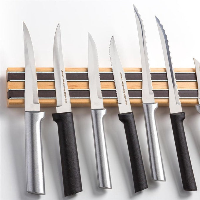Handcrafted heavy duty hardwood magnetic rack with dual strips holding a variety of kitchen knives with metal and black handles, ideal for kitchen, food prep, and tool organization in Farm, Garden & Tool and Best Sellers collections.