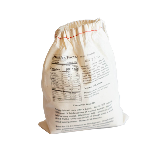Handcrafted natural cotton drawstring bag of Lehman's cinnamon biscuit mix with printed nutrition facts and baking instructions, perfect for Kitchen & Food, Pantry, Dry Goods, and Best Sellers collections.