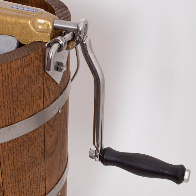 Close-up of the hand crank and metal hardware on a handcrafted Amish made wooden ice cream freezer, highlighting durable construction for Kitchen & Food and Specialty Equipment collections.