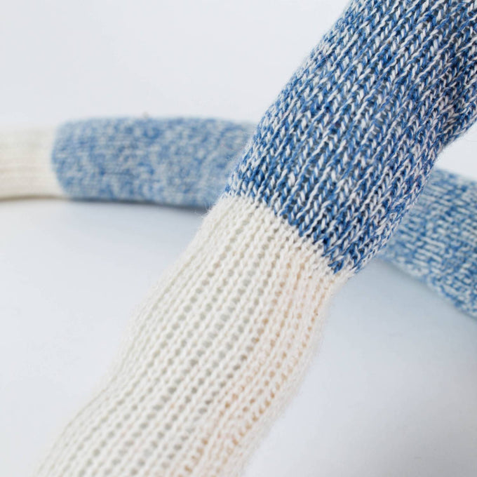 Close-up of a handmade blue and white knit arm detail from a Hand-Sewn Sock Monkey, crafted with fiberfill stuffing, featured in Toys, Books & Games, USA Made, and Children's Toys collections.