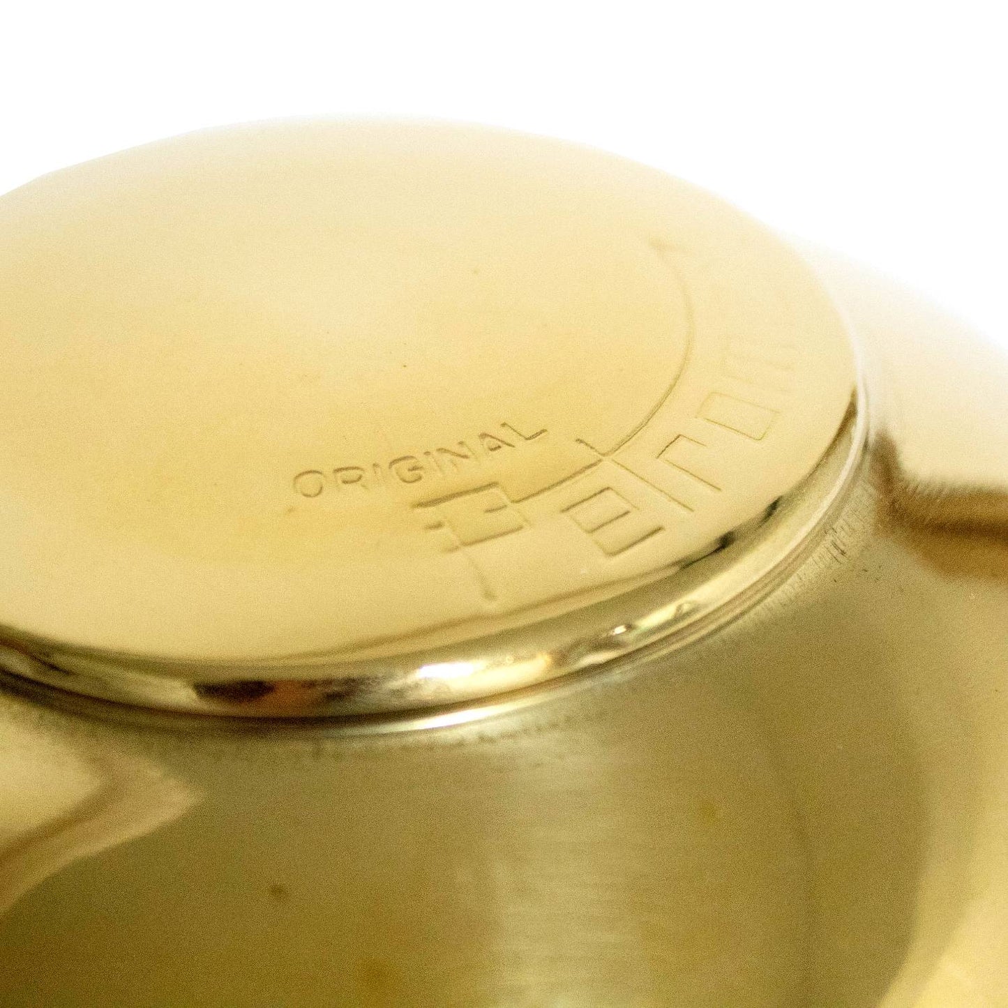 Close-up of a polished brass lamp hood with embossed lettering, designed for ventilation and protection, featured in Lamps & Lighting, Parts and Accessories, and Best Sellers collections.