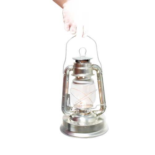 Handcrafted metal lantern with clear glass globe and sturdy handle, designed for reliable bright lighting in farm, garden, camping, emergency supplies, and outdoor use.