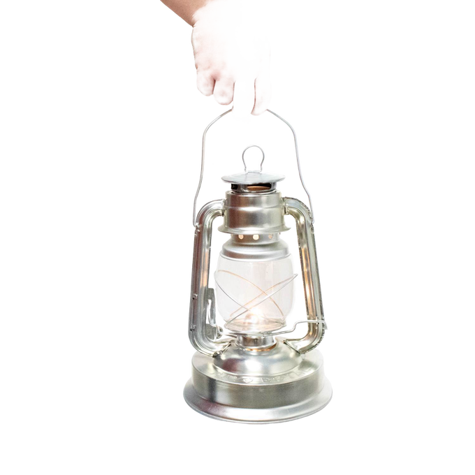 Handcrafted metal lantern with clear glass globe and sturdy handle, designed for reliable bright lighting in farm, garden, camping, emergency supplies, and outdoor use.