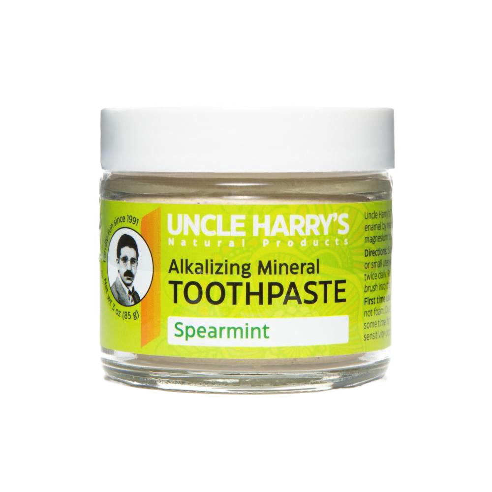 Handcrafted small glass jar of spearmint alkalizing mineral toothpaste with a white lid and bright green label, featured in Health & Wellness, Grooming and Personal Hygiene, USA Made, and Best Sellers collections.