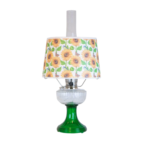 Handcrafted oil lamp featuring an Ohio-made emerald glass base and sunflower-patterned shatterproof shade, ideal for Farm, Garden & Tool and Table Lamps collections.
