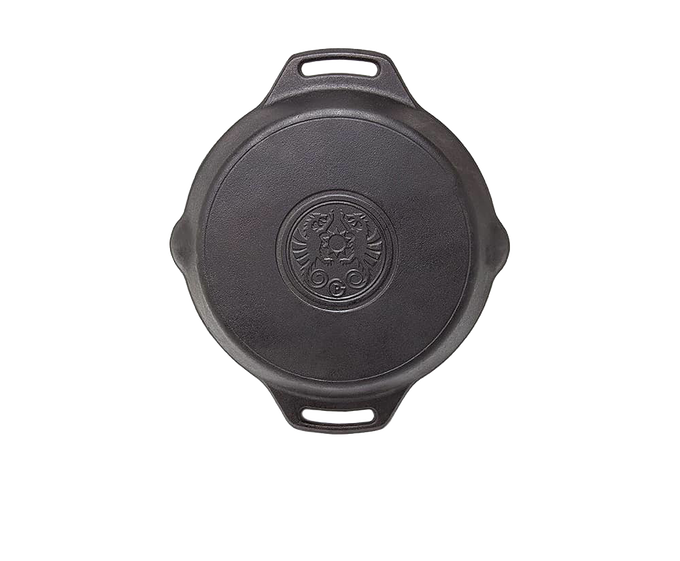 Top view of a handcrafted cast iron skillet with two side handles and an embossed design in the center, ideal for cooking in camping, kitchen, and farm settings.