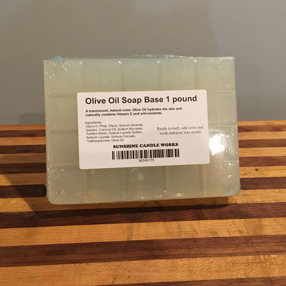 Handcrafted translucent olive oil soap base bar weighing one pound, naturally infused with Vitamin E and antioxidants, perfect for Health & Wellness and Soapmaking Supplies collections.