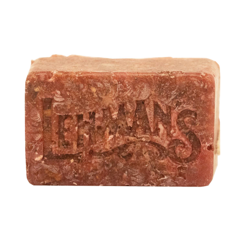 Handcrafted reddish-brown fire starter block embossed with Lehman’s logo, made in the USA from natural reclaimed wax and sawdust, perfect for stoves, camping, and hearth accessories.