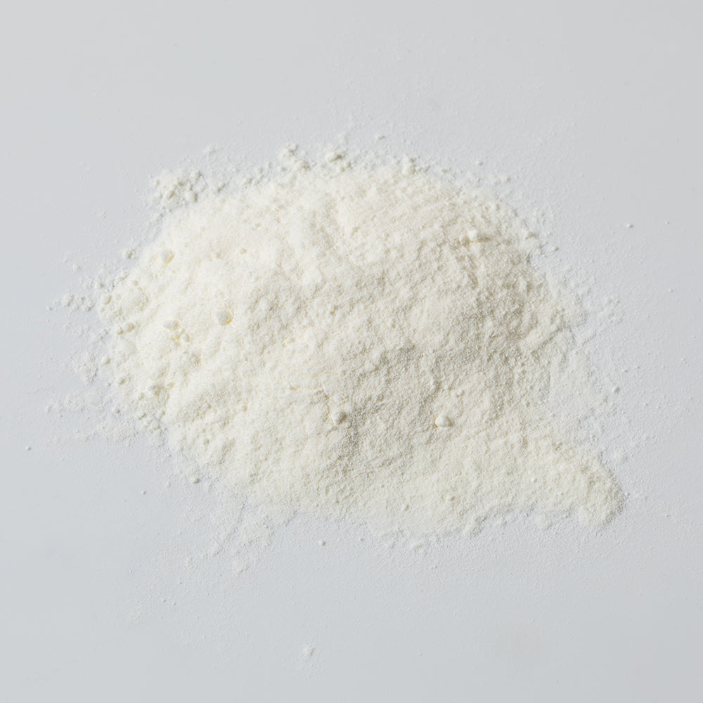 Fine off-white powdered butter in a loose pile, suitable for long-term pantry storage and emergency supplies, perfect for Farm, Garden & Tool, Kitchen & Food, USA Made, and Best Sellers collections.