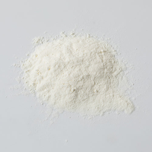 Fine off-white powdered butter in a loose pile, suitable for long-term pantry storage and emergency supplies, perfect for Farm, Garden & Tool, Kitchen & Food, USA Made, and Best Sellers collections.