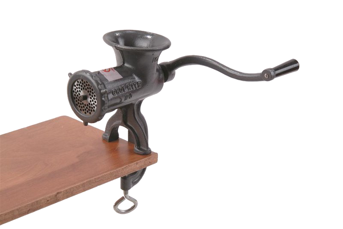 Black clamp-down meat grinder with a long hand crank attached to a wooden surface, featuring a tough Xylon coating and FDA-approved finish, ideal for Kitchen & Food, Specialty Equipment, Butchering Supplies, USA Made, Best Sellers, and Promo Eligible collections.