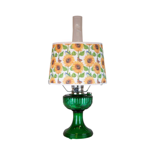 Handcrafted oil lamp featuring an Ohio-made emerald glass base and a bright sunflower-patterned shatterproof shade, ideal for Farm, Garden & Tool and Lamps & Lighting collections.