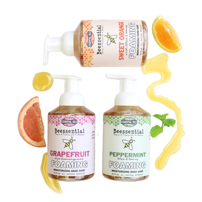 Three 16 fl oz pump bottles of handcrafted natural moisturizing foaming hand soap in sweet orange, grapefruit and lemongrass, and peppermint with aloe and honey, made in the USA, ideal for Health & Wellness, Soaps, USA Made, and Best Sellers collections.
