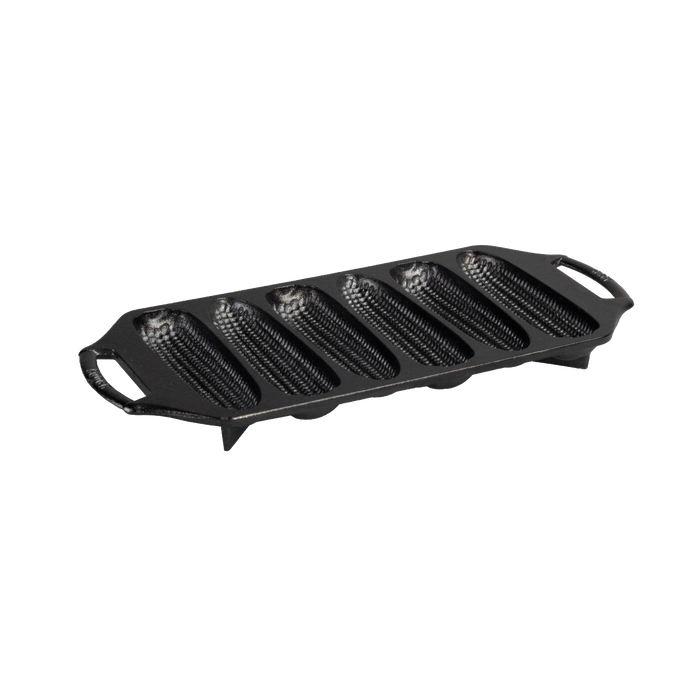 Cast iron cornstick pan with six elongated molds, dual handles for easy grip, angled feet for oven stability, naturally seasoned and made in USA, ideal for Kitchen & Food and Cast Iron cookware collections.