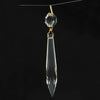 Clear glass pendant prism with faceted octagon and elongated teardrop shapes, featuring a polished brass pin, ideal for lamps and lighting accessories and best sellers collection.