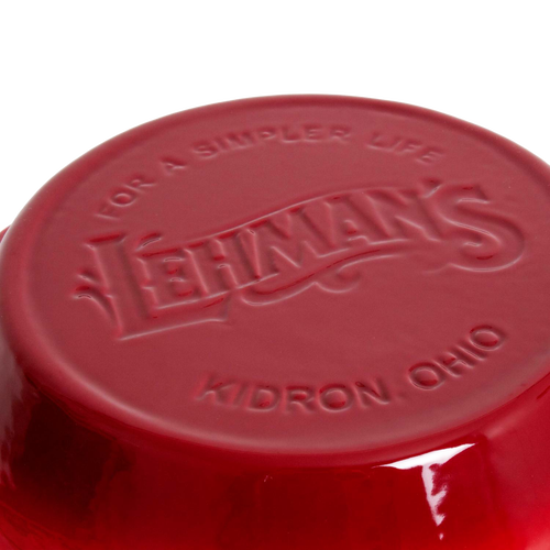 Close-up of the bottom of a handcrafted red ceramic kitchen bowl embossed with Lehman’s logo and location, ideal for Kitchen & Food and Cookware collections.