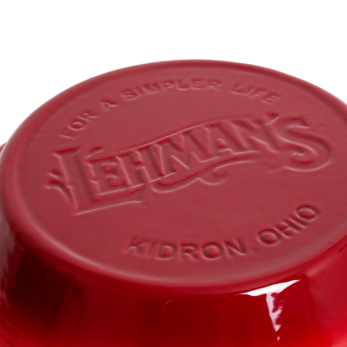 Close-up of the bottom of a handcrafted red ceramic kitchen bowl embossed with Lehman’s logo and location, ideal for Kitchen & Food and Cookware collections.