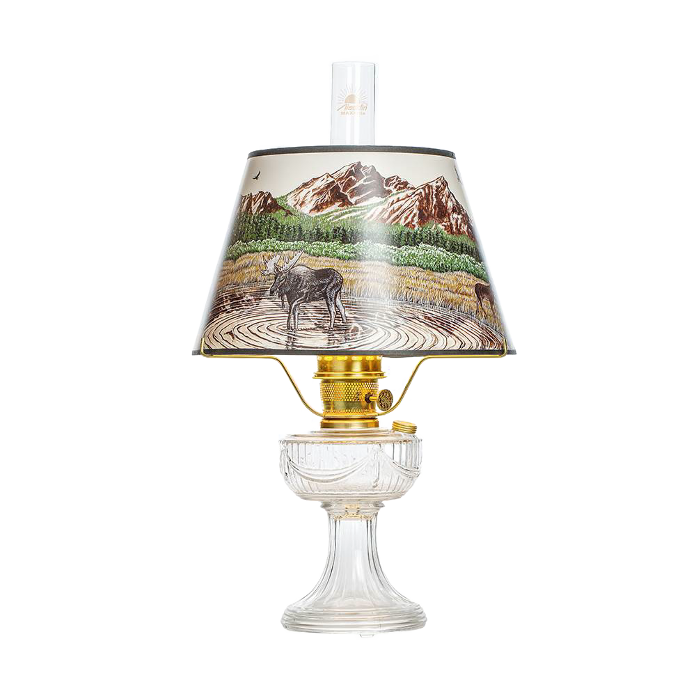 Aladdin Lincoln drape oil lamp featuring a clear USA-made glass font, brass burner, and a Rocky Mountain scenic parchment shade, perfect for Lamps & Lighting, Oil Lamps, Table Lamps, Best Sellers, and Promo Eligible collections.
