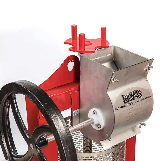 Red-framed stainless steel cider press with black hand crank wheel and fruit crusher, part of Farm, Garden & Tool, Apple Harvest Supplies, Orchard and Grove, and Best Sellers collections.