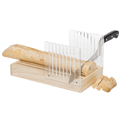 Handcrafted wooden bread slicing guide with clear acrylic panels for uniform slices, featuring a removable crumb tray, shown slicing a baguette with a serrated knife in Kitchen & Food collections.