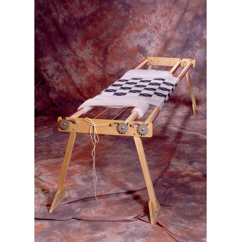 Handcrafted Amish made wooden quilt frame with sturdy unfinished legs and rollers, designed for sewing and quilting, featured in Home & Decor, USA Made, Amish Made, and Best Sellers collections.