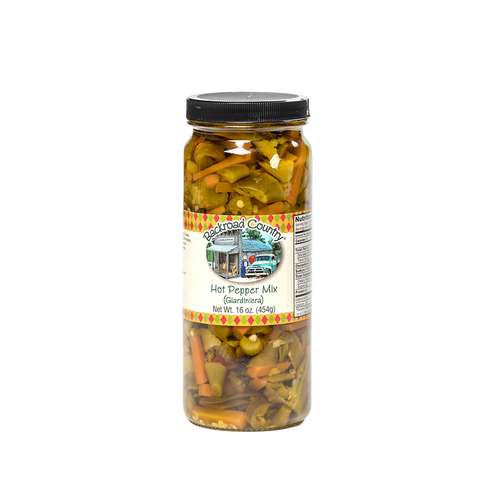 Tall glass jar of handcrafted hot pepper mix with visible sliced peppers and vegetables, made in USA, ideal for Kitchen & Food, Pantry, and Best Sellers collections at Lehman’s.