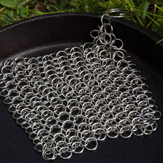 Handcrafted stainless steel chainmail scrubber designed for cleaning cast and wrought iron cookware, featured in Home & Decor, Household Cleaning, and Cleaning Utensils and Gadgets collections.