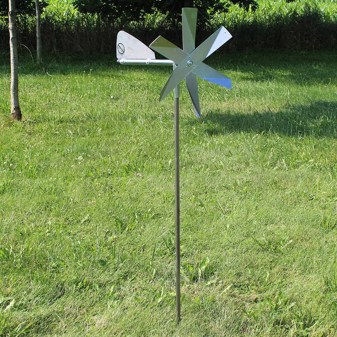 Handcrafted Amish-made mole chaser featuring polished metal blades and tail vane on a slim galvanized steel post, designed for humane pest control in Farm, Garden & Tool, Garden Accessories, Lawncare, Pest Control, Best Sellers, and Promo Eligible collections.