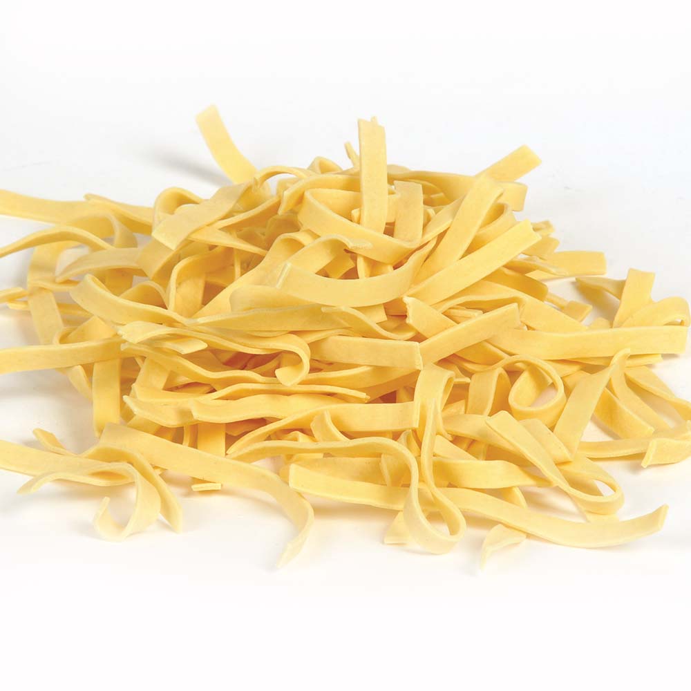 Pile of handcrafted Amish-style egg noodles made in USA, suitable for Kitchen & Food, Pantry, Food, USA Made, Best Sellers, and Promo Eligible collections.