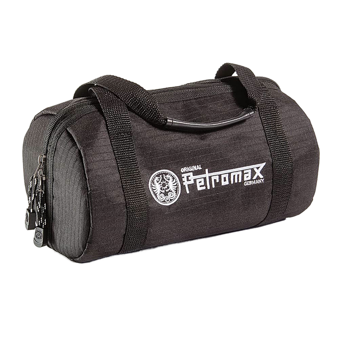 Compact black ripstop transport bag with durable handles and zippered closure, designed for secure packing, featured in Kitchen & Food, Cookware, Cast Iron, and Best Sellers collections.